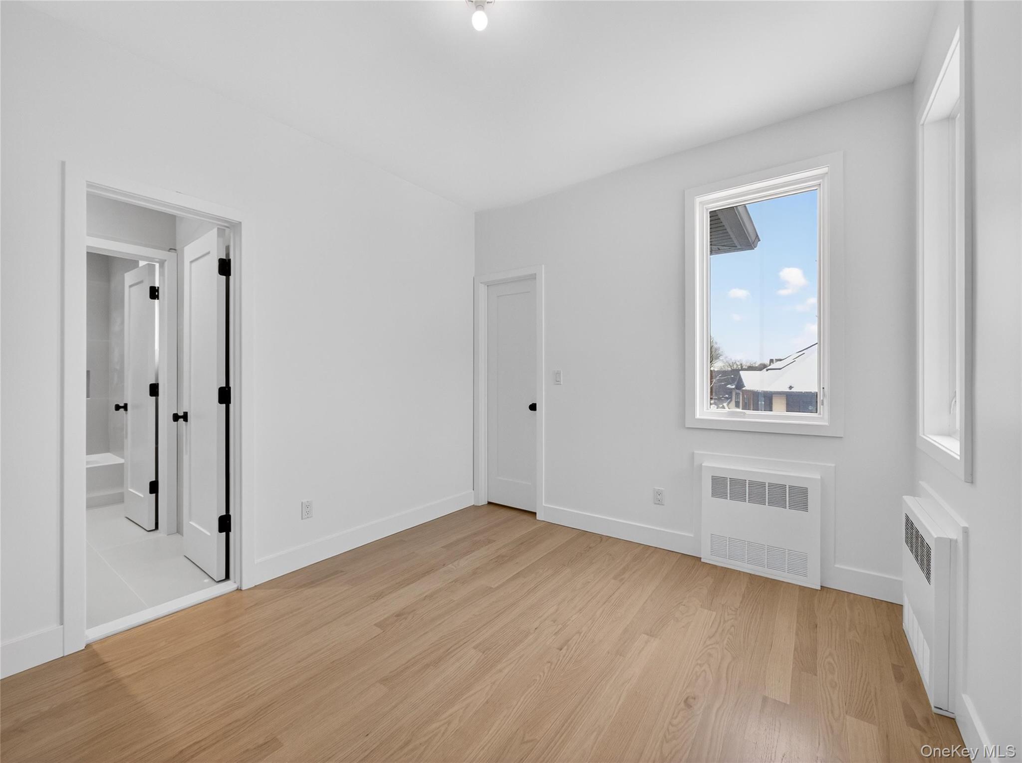 13 Elener Lane, Unit 202 Spring Valley, NY 10977 - Photo 26 of 48 wooden floor in an empty room