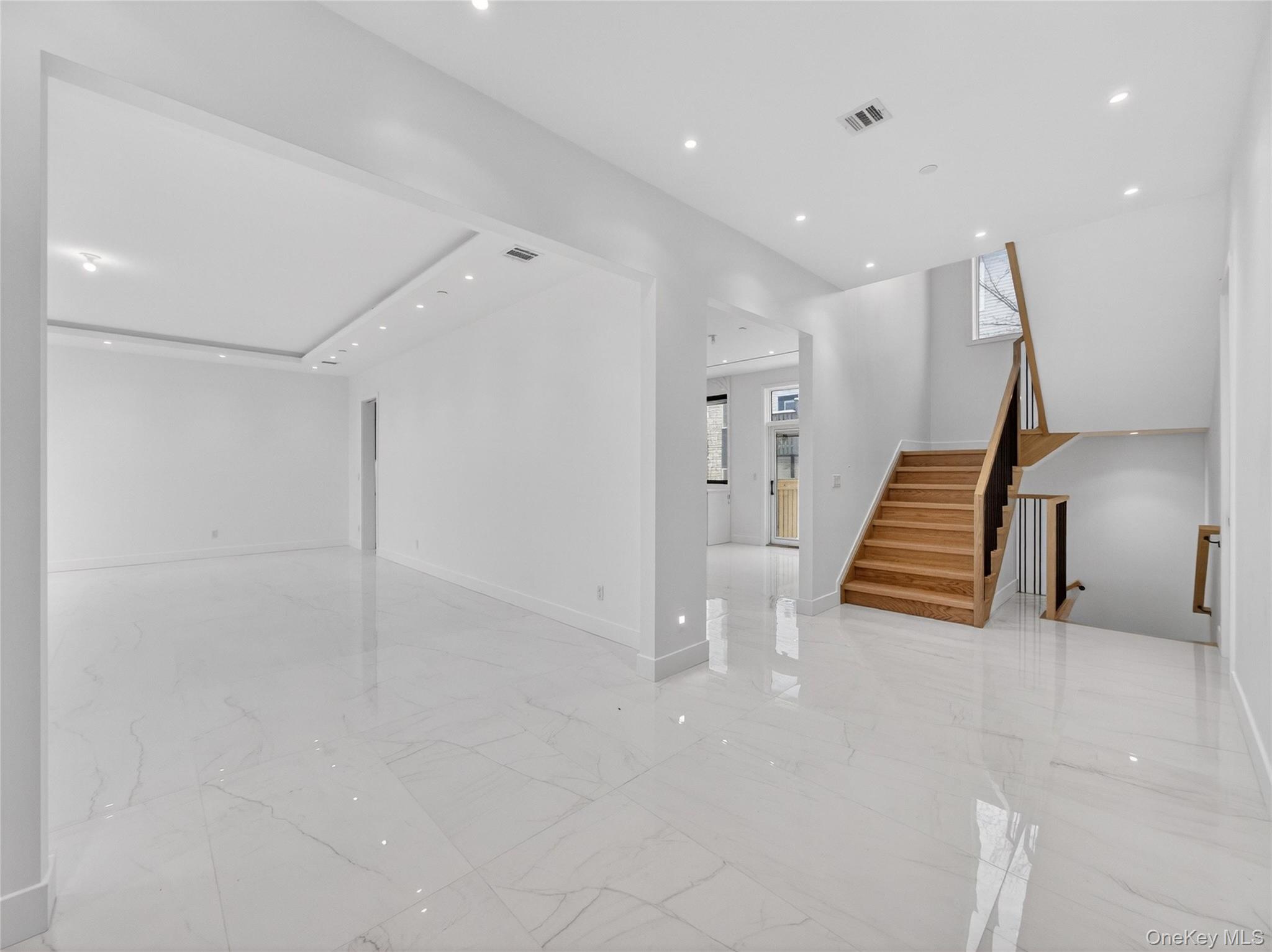 13 Elener Lane, Unit 202 Spring Valley, NY 10977 - Photo 4 of 48 a view of a hallway with staircase
