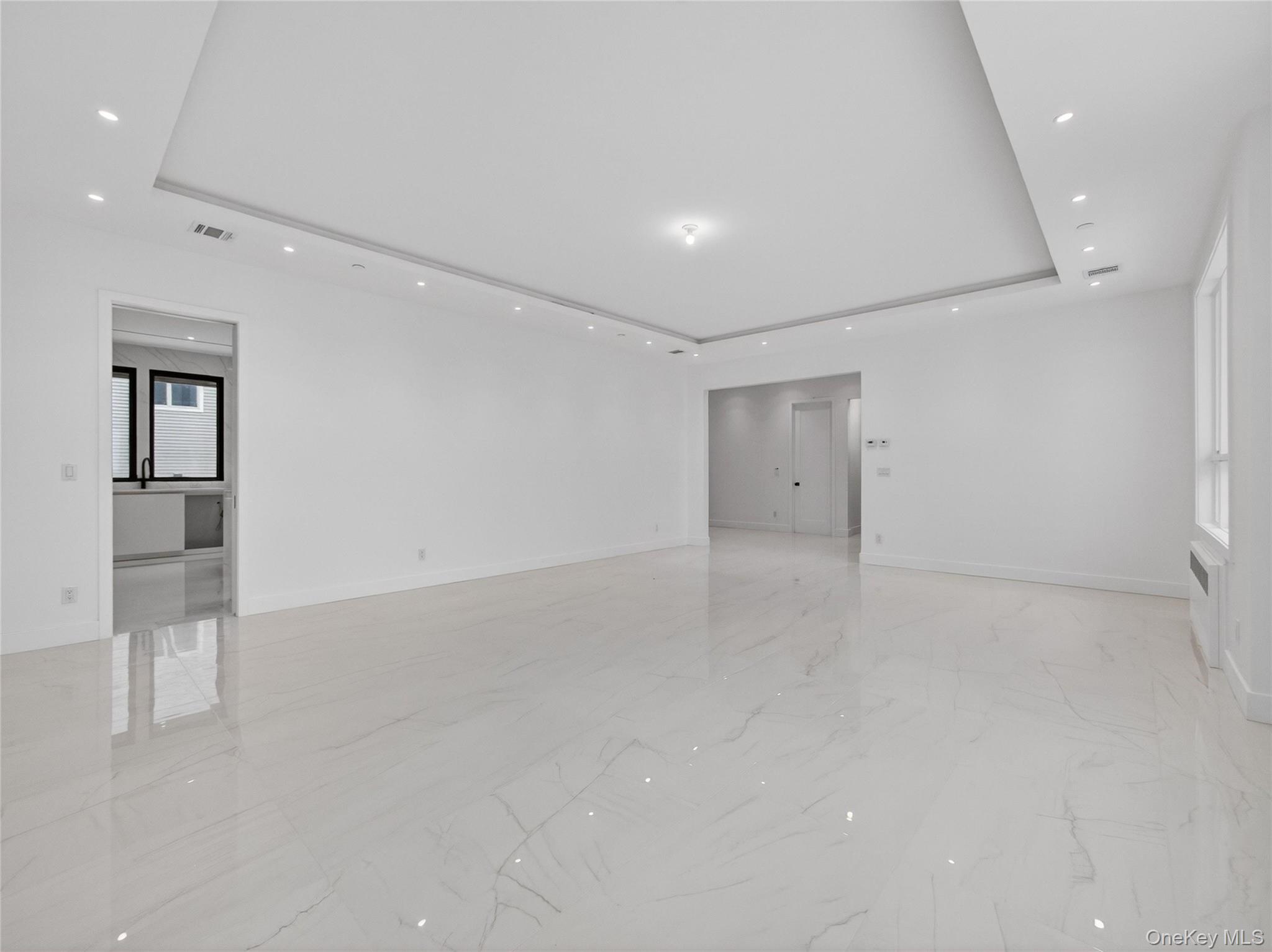 13 Elener Lane, Unit 202 Spring Valley, NY 10977 - Photo 6 of 48 an empty room with windows and closet