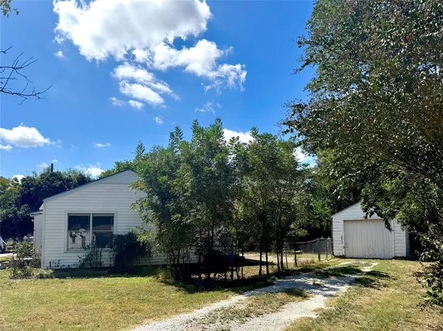 a view of a house with swimming pool