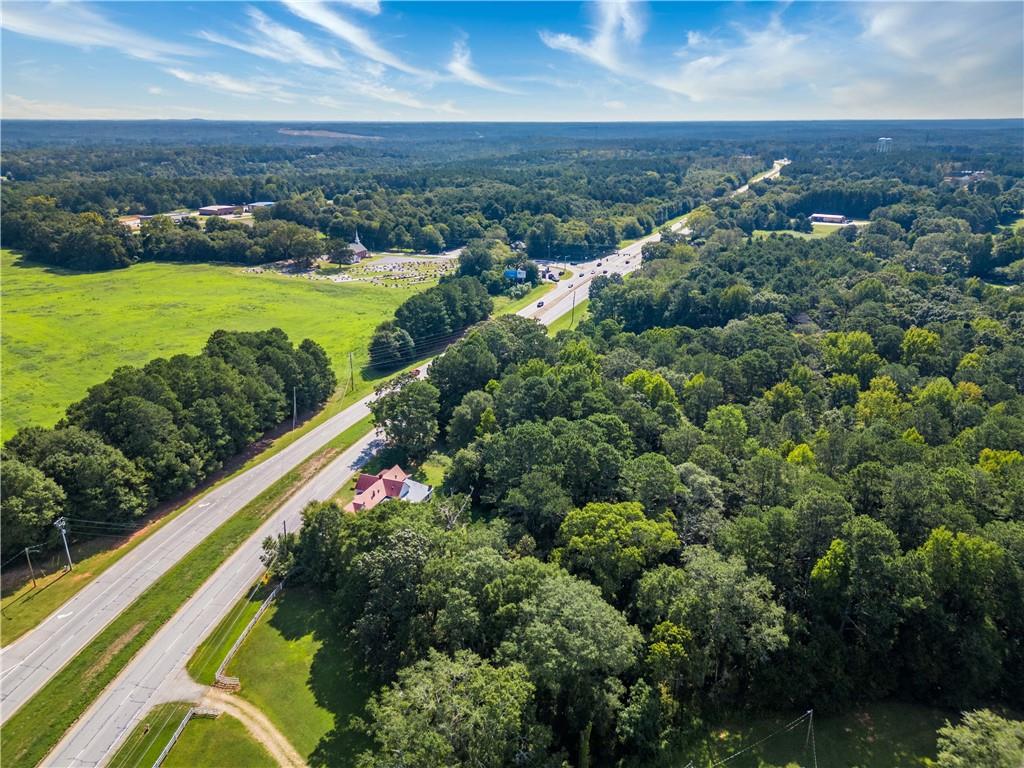 2020 Highway 78 Monroe, GA 30655 - Photo 6 of 10 an aerial view of residential houses with outdoor space and trees