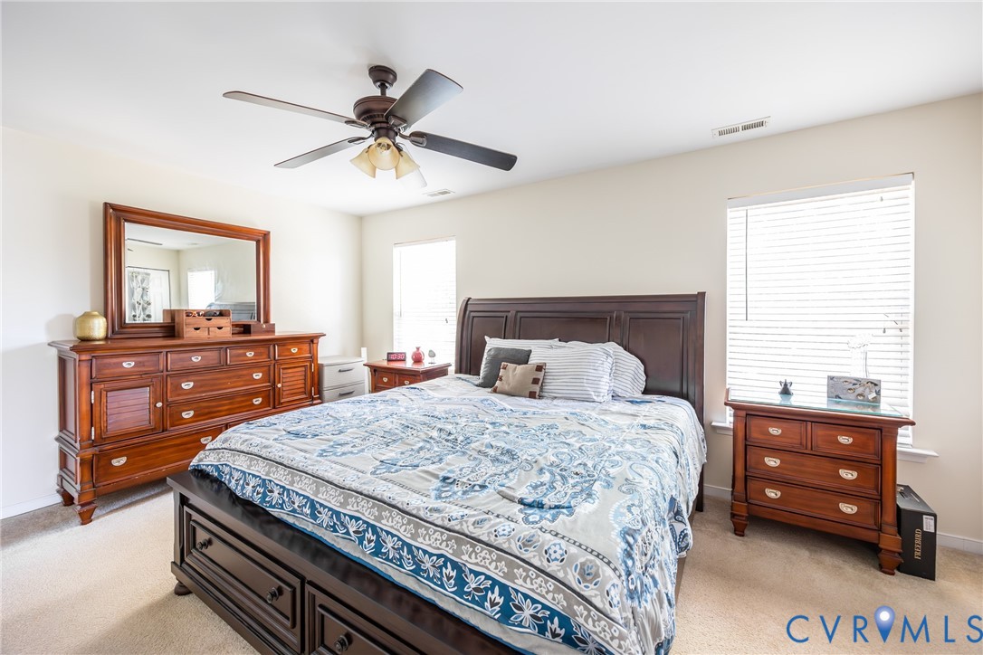 2928 Heather Ridge Drive Henrico, VA 23231 - Photo 19 of 34 Carpeted bedroom featuring a ceiling fan with ligh
