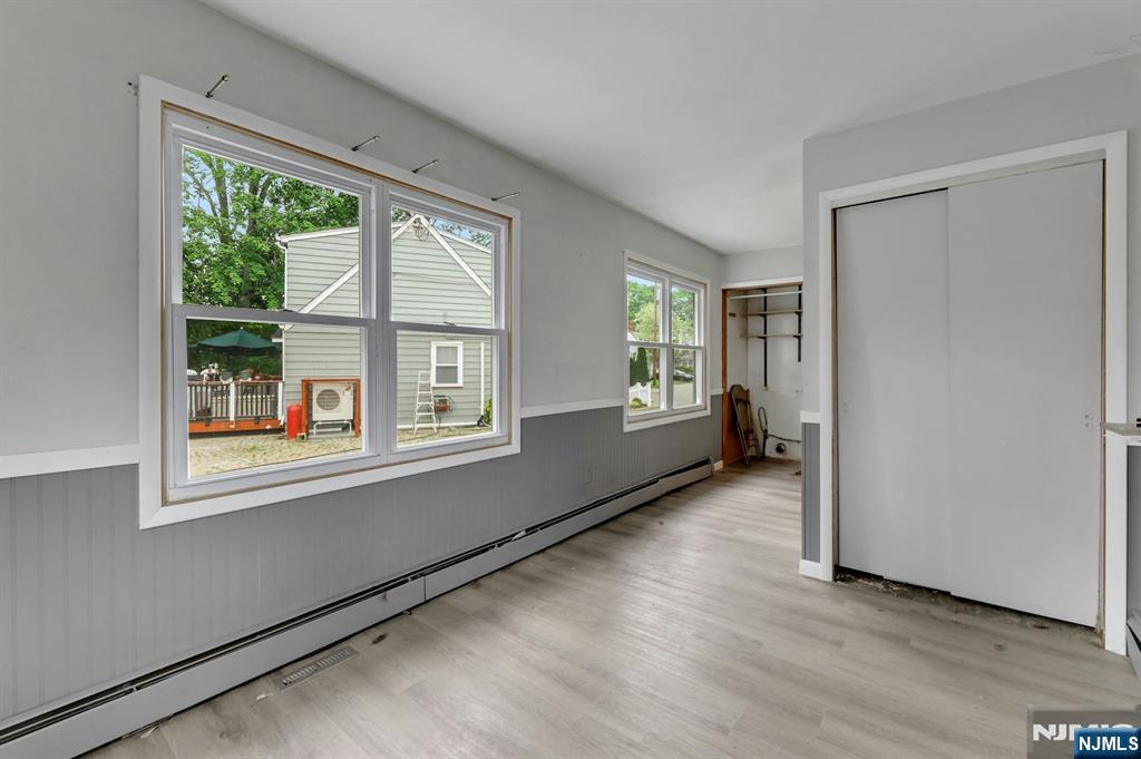 17 Butler Place Wanaque, NJ 07420 - Photo 7 of 28 an empty room with windows