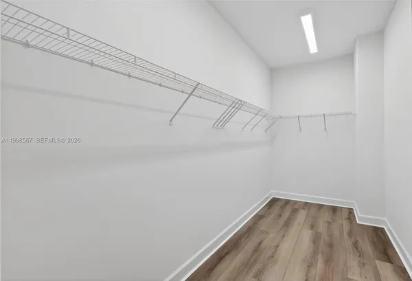 a view of a room with racks on the wall