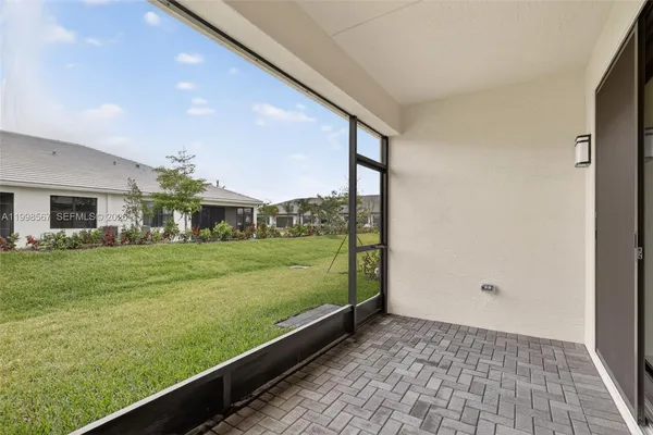 a view of a porch with a yard