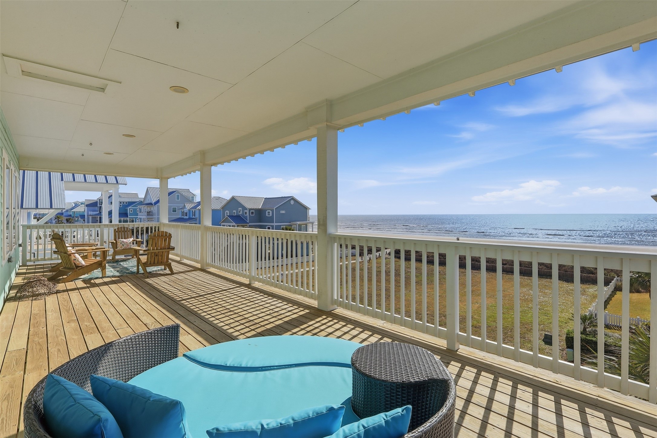 11622 Beachside Galveston, TX 77554 - Photo 23 of 39 The spacious beachfront deck offers stunning ocean views, perfect for relaxation.