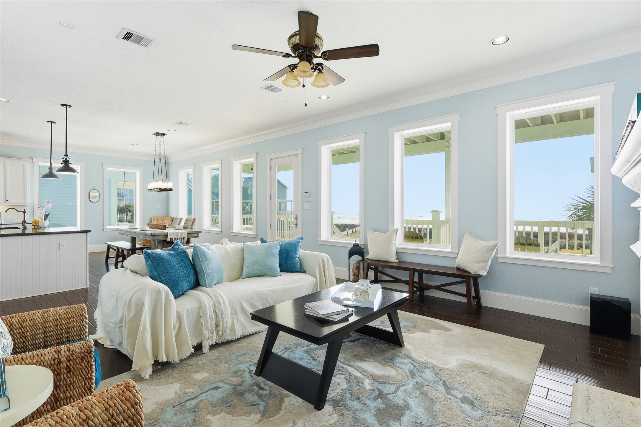 11622 Beachside Galveston, TX 77554 - Photo 39 of 39 Bright and airy living space with large windows offering ocean views and open floor plan. Perfect for relaxed coastal living.