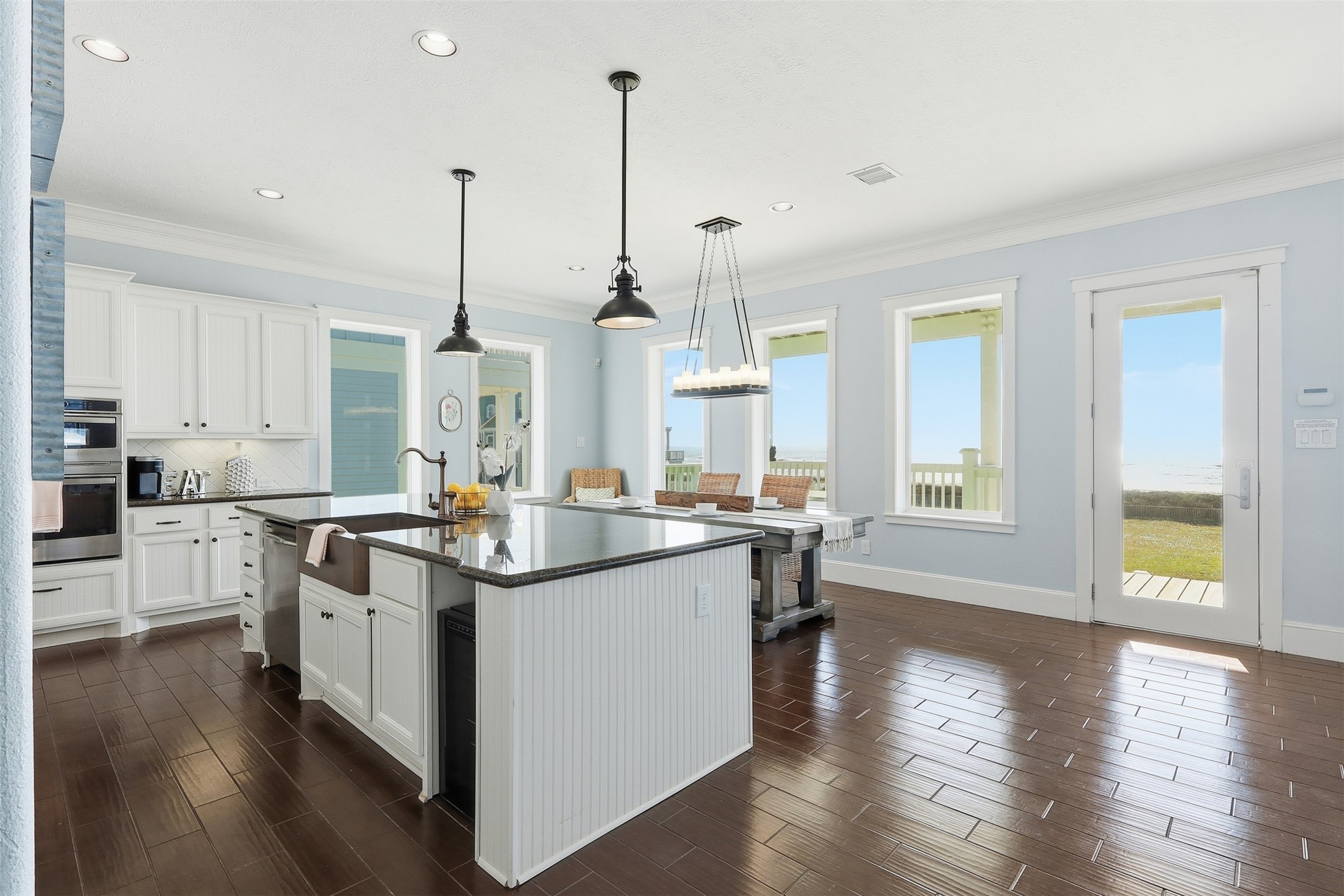 11622 Beachside Galveston, TX 77554 - Photo 3 of 39 Bright and spacious kitchen with modern appliances, large island, and elegant lighting.