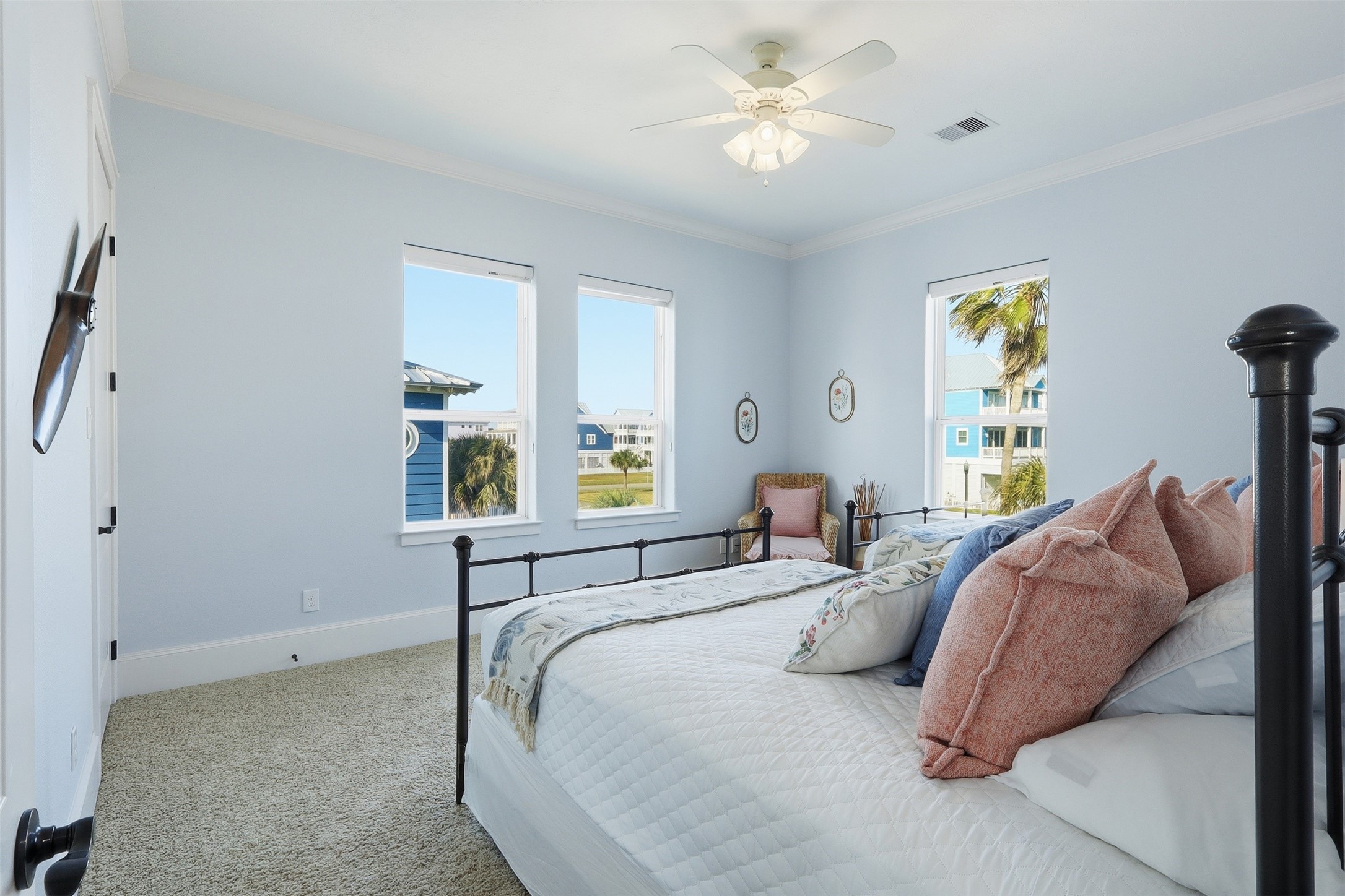 11622 Beachside Galveston, TX 77554 - Photo 8 of 39 This bright bedroom features ample natural light from three windows. The room offers a serene and airy atmosphere with a nice view outside.