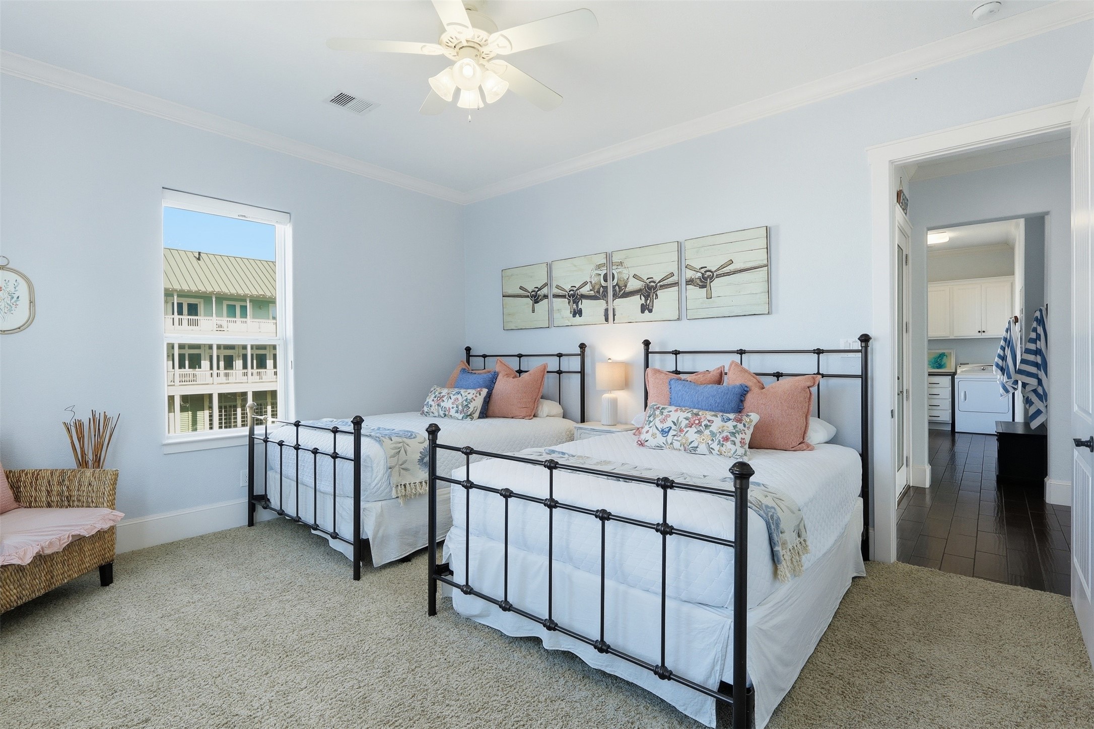 11622 Beachside Galveston, TX 77554 - Photo 9 of 39 Bright and inviting bedroom featuring two beds and connects to a ensuite bathroom.