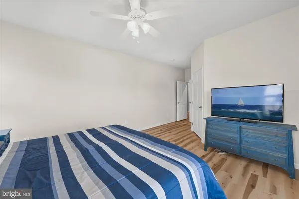 a bathroom with a shower and a toilet