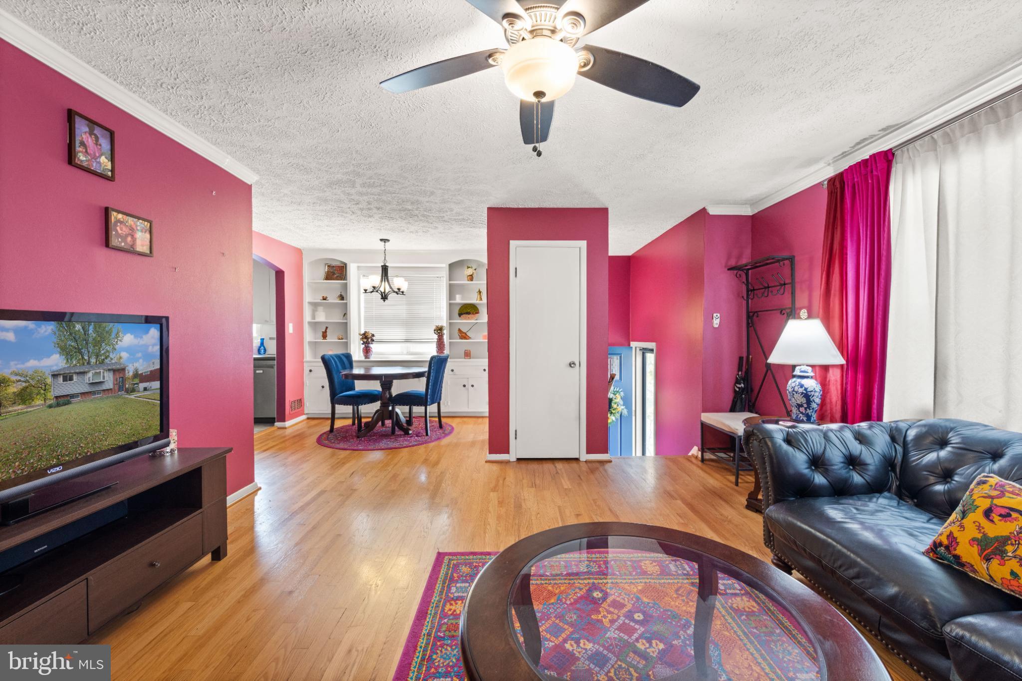 3700 Ralph Road Silver Spring, MD 20906 - Photo 26 of 30 a living room with furniture and a flat screen tv