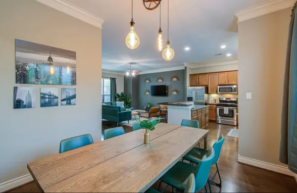 a view of a dining room with furniture