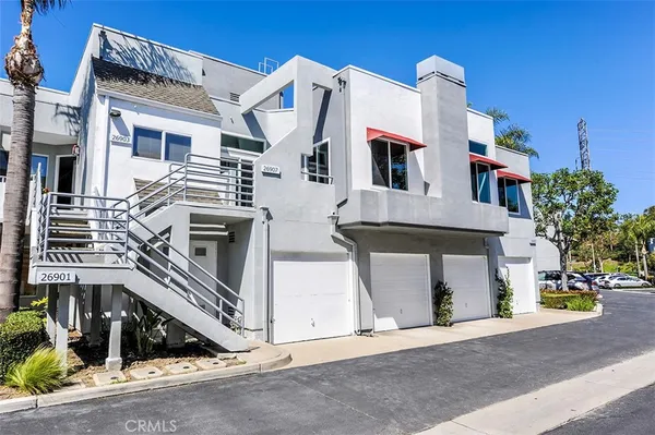 a front view of a house with a garage