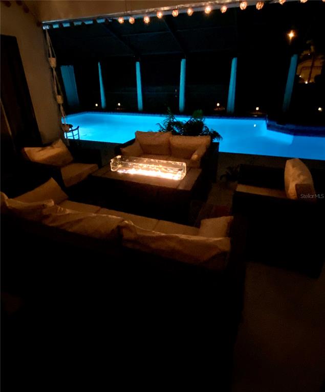 8911 Welsh Way Hudson, FL 34667 - Photo 33 of 33 a view of a yard with an outdoor seating