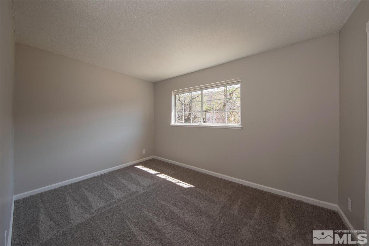 1230 Butler Street Reno, NV 89512 - Photo 14 of 21 an empty room with windows