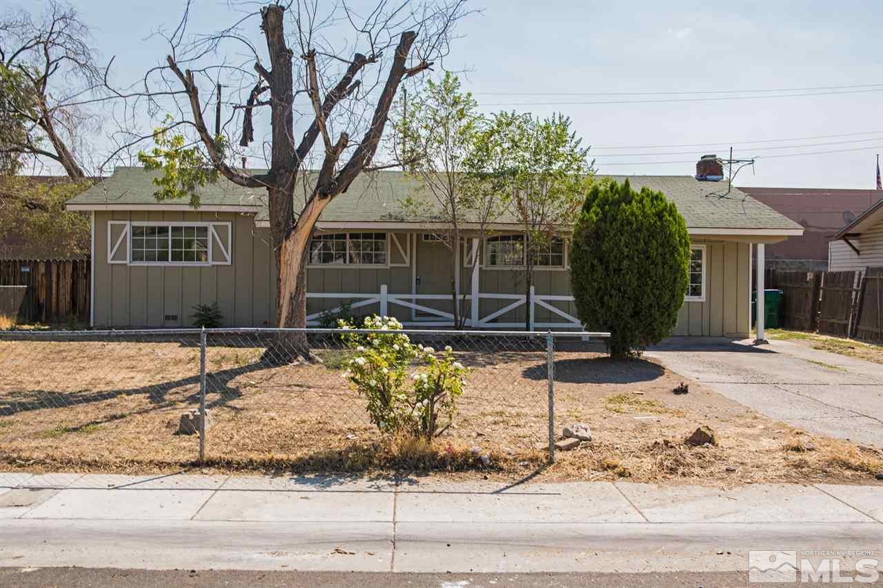 1230 Butler Street Reno, NV 89512 - Photo 20 of 21 a house with trees in front of it