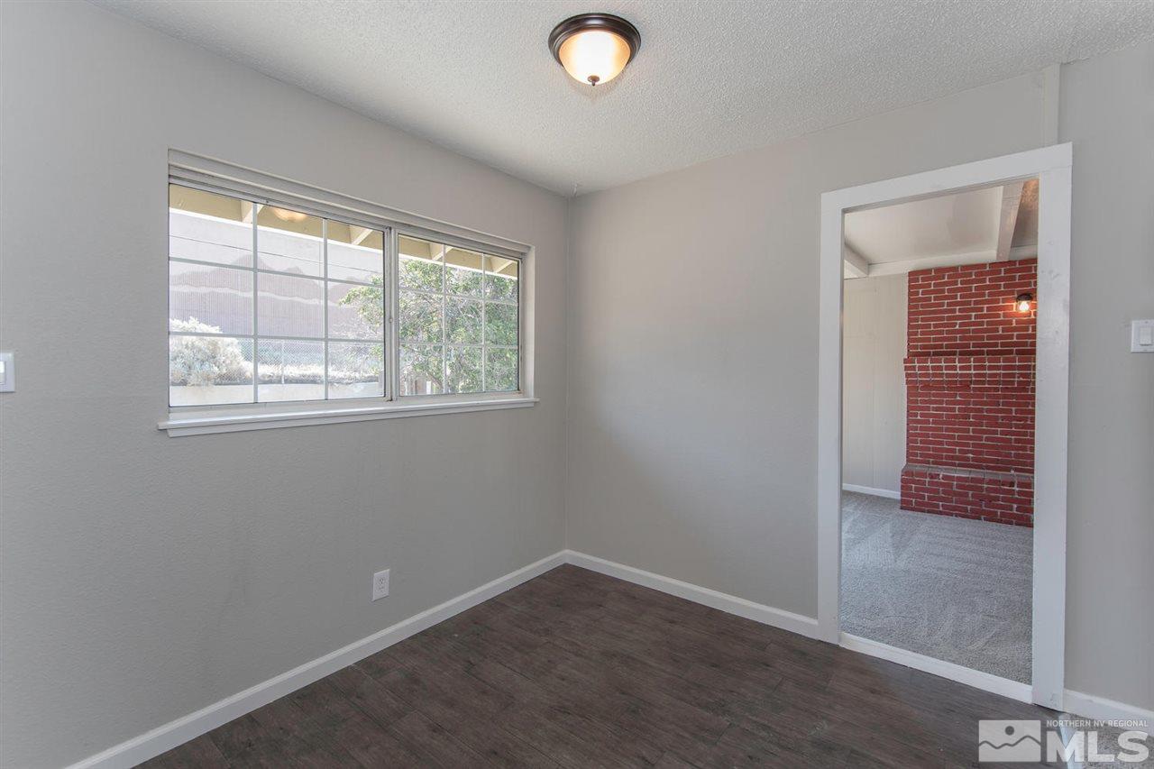 1230 Butler Street Reno, NV 89512 - Photo 8 of 21 an empty room with windows and closet