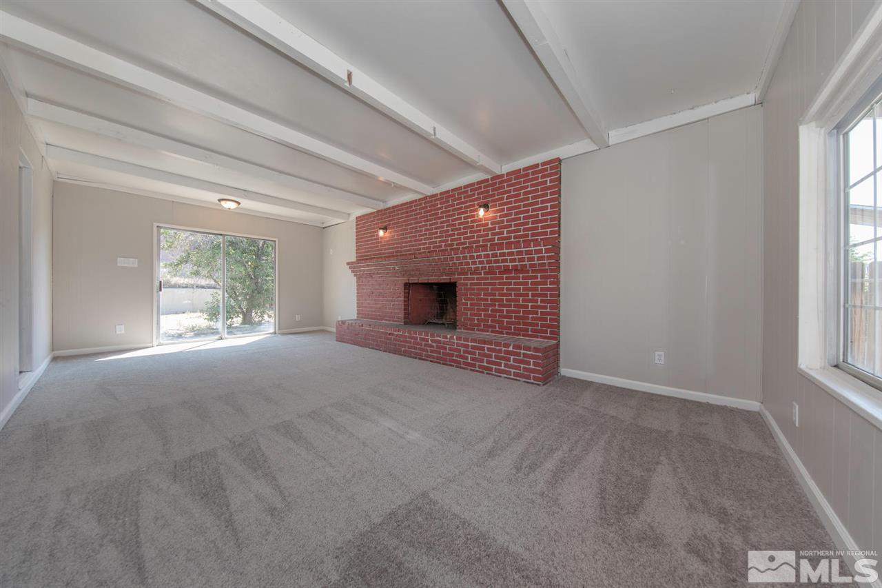1230 Butler Street Reno, NV 89512 - Photo 9 of 21 a view of empty room with windows