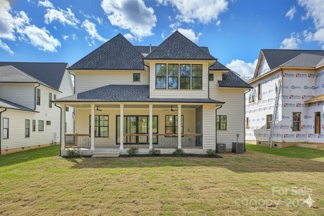 a view of a house with a swimming pool