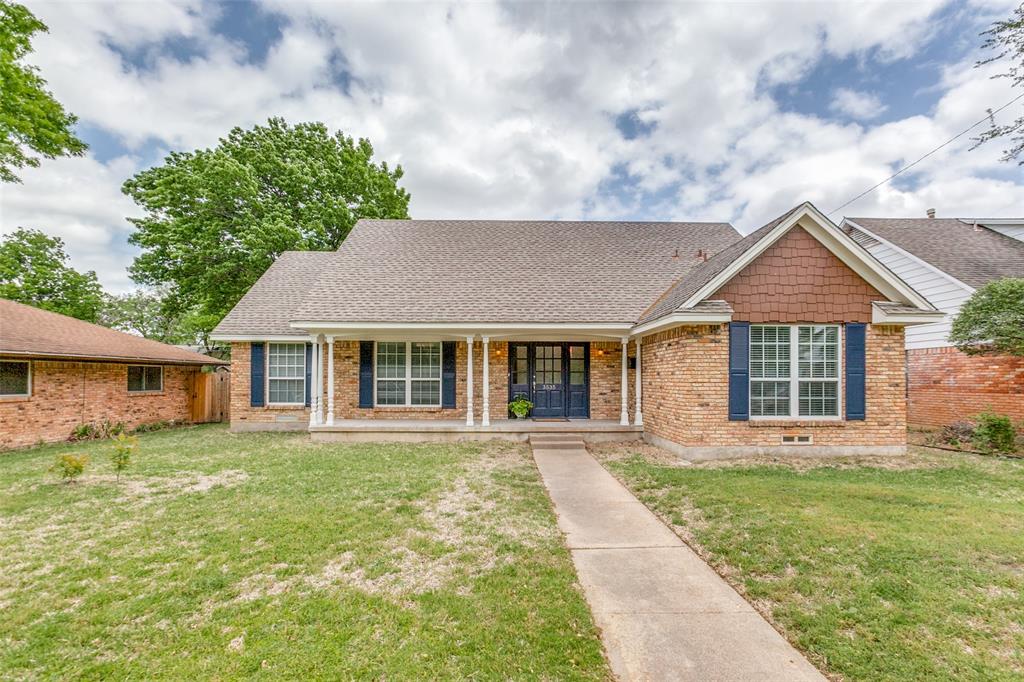 3535 Delford Circle Dallas, TX 75228 - Photo 1 of 1 front view of a house with a yard