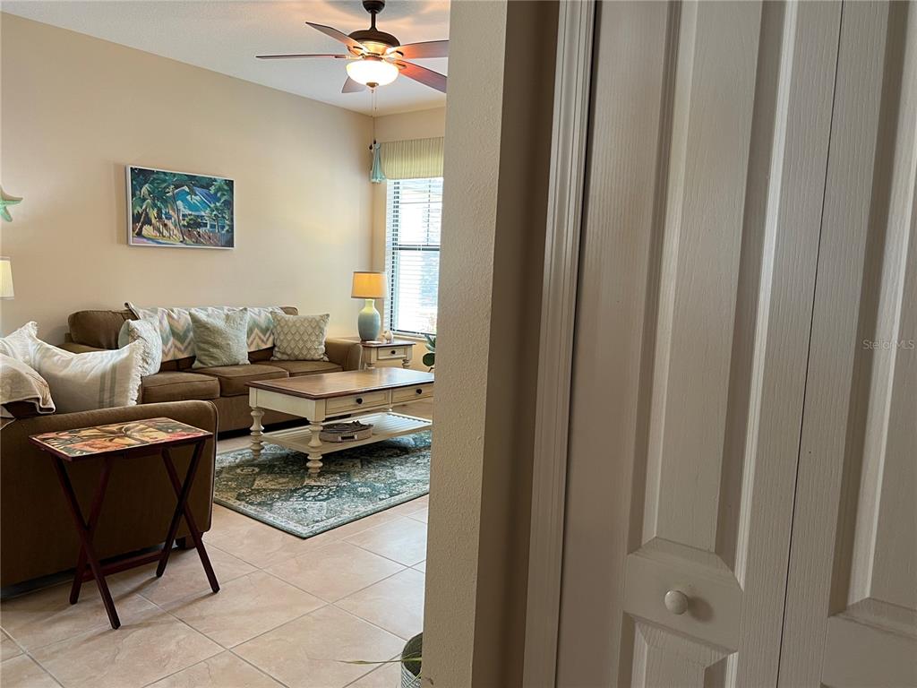 2002 Fishtail Fern Way Ocoee, FL 34761 - Photo 18 of 51 a living room with furniture and a window