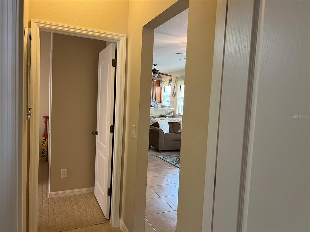 2002 Fishtail Fern Way Ocoee, FL 34761 - Photo 30 of 51 a view of a bathroom from a hallway