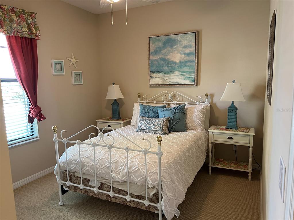 2002 Fishtail Fern Way Ocoee, FL 34761 - Photo 33 of 51 a bedroom with a bed and window