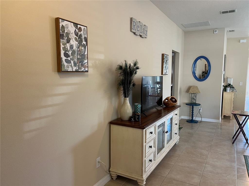 2002 Fishtail Fern Way Ocoee, FL 34761 - Photo 4 of 51 a kitchen with a sink and a clock