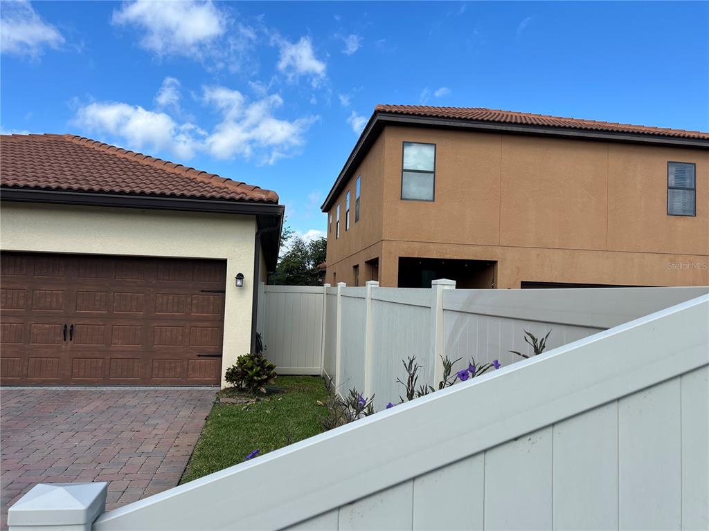 2002 Fishtail Fern Way Ocoee, FL 34761 - Photo 41 of 51 a view of house with outdoor space