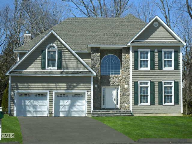 32 Walnut Ridge Lane Stamford, CT 06905 - Photo 1 of 1 front view of a house with a yard