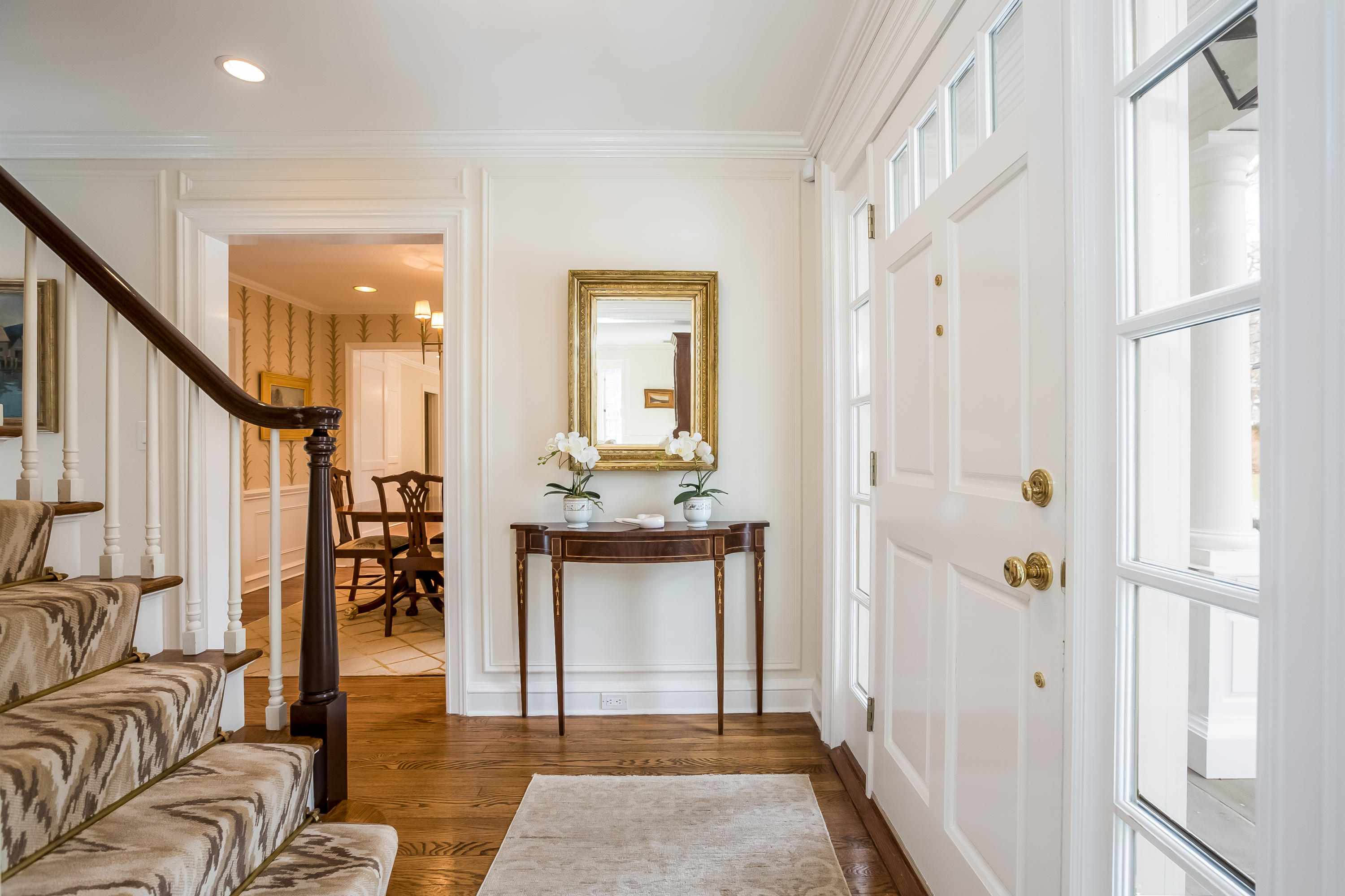 29 Birch Road Darien, CT 06820 - Photo 3 of 38 a spacious bathroom with a granite countertop sink and a mirror