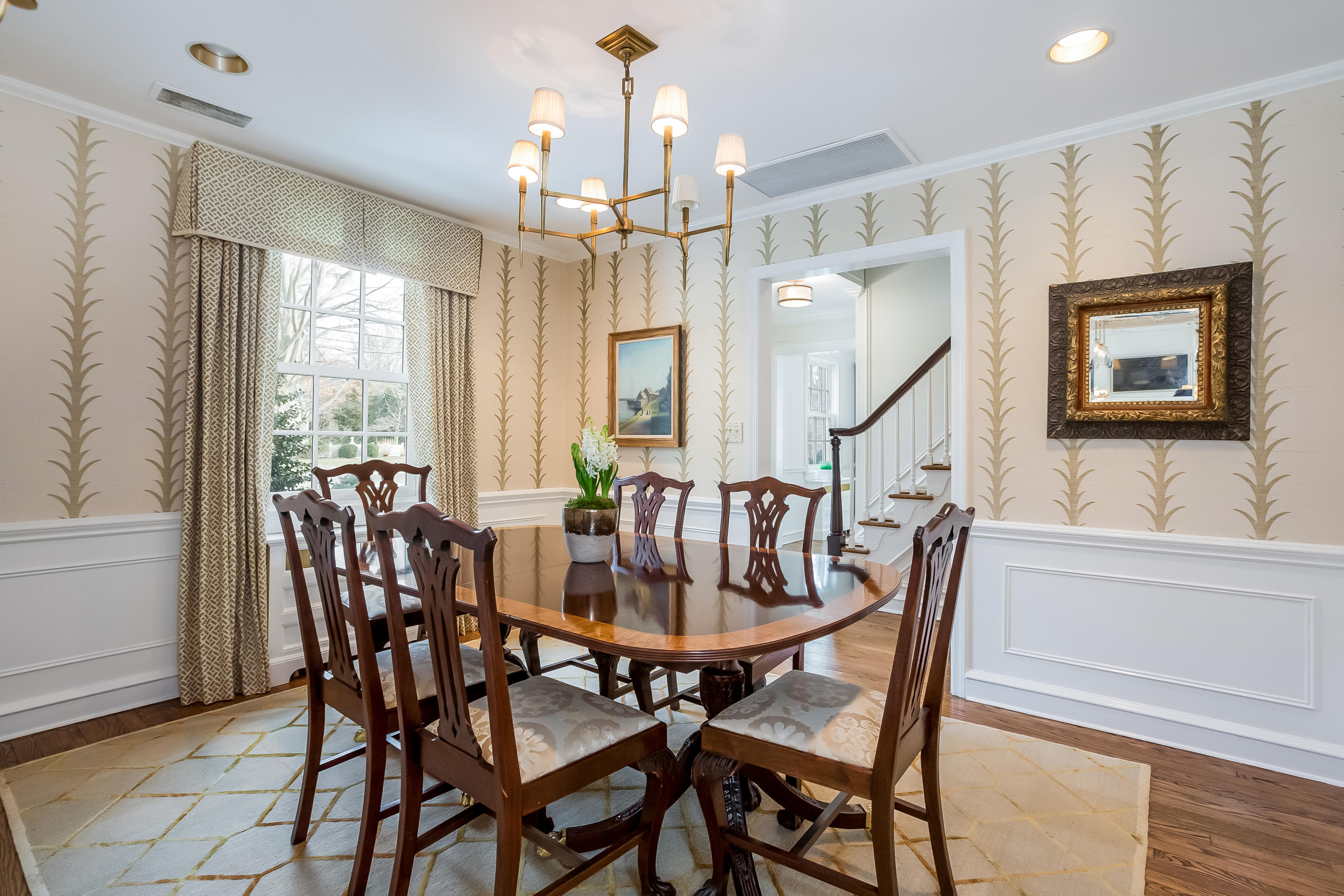 29 Birch Road Darien, CT 06820 - Photo 6 of 38 a view of a dining room with furniture window and wooden floor