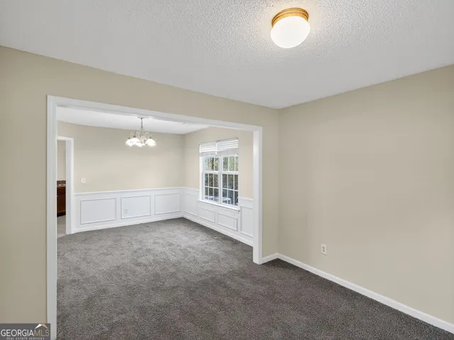 an empty room with window