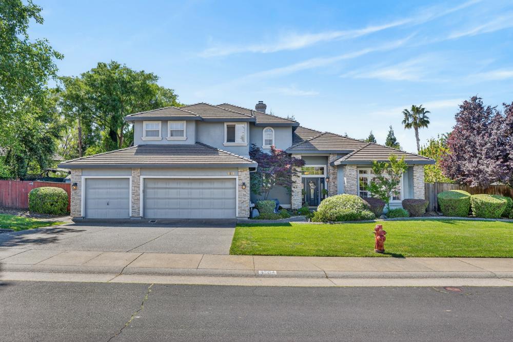6504 Swallowsview Court Rocklin, CA 95677 - Photo 1 of 66 a front view of a house with a yard and garage