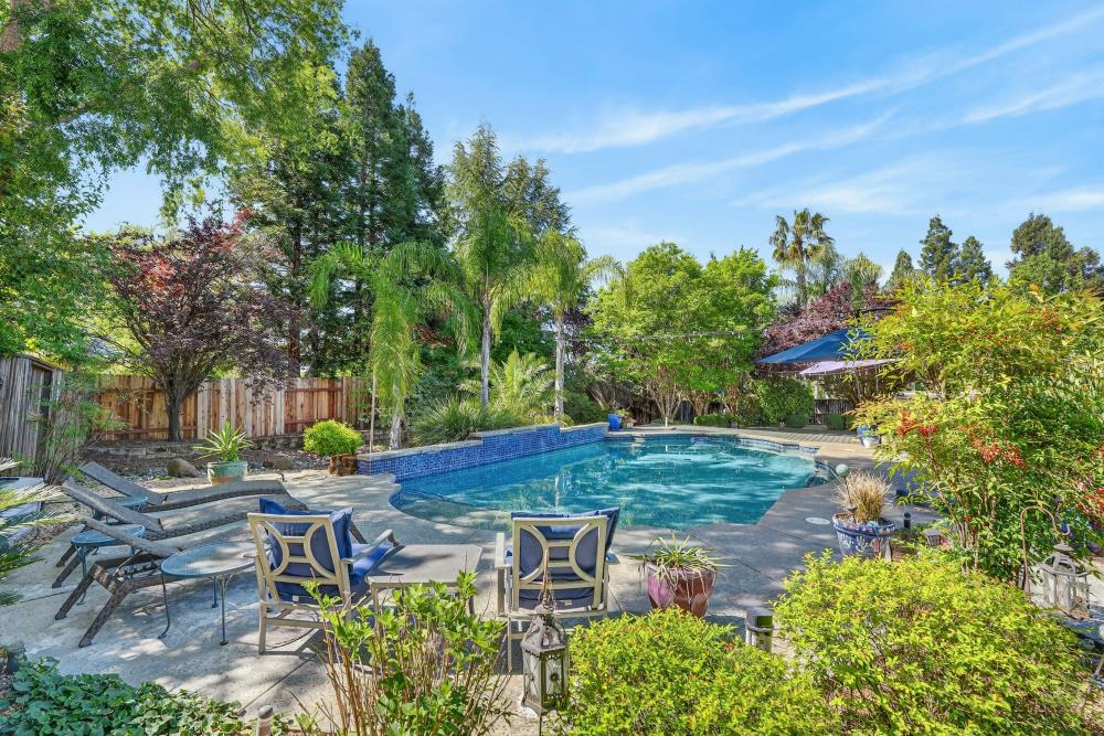 6504 Swallowsview Court Rocklin, CA 95677 - Photo 2 of 66 a backyard of a house with yard and outdoor seating