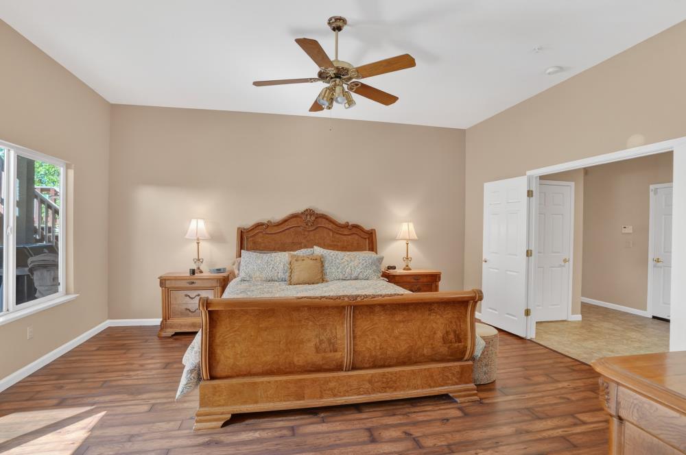 6504 Swallowsview Court Rocklin, CA 95677 - Photo 31 of 66 a bedroom with a bed and window