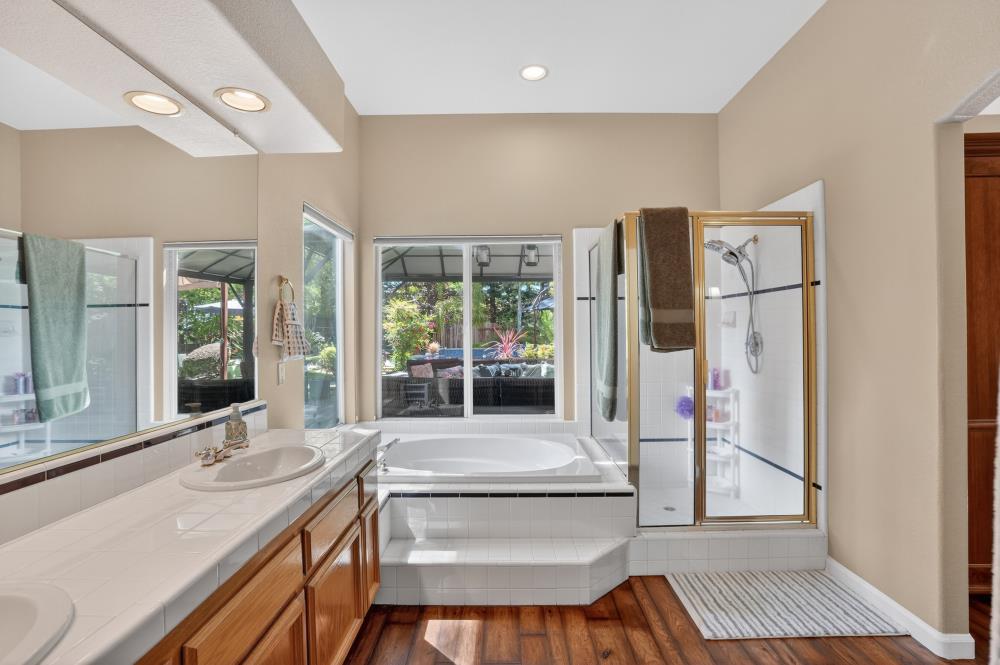 6504 Swallowsview Court Rocklin, CA 95677 - Photo 34 of 66 a living room with stainless steel appliances furniture and a large window