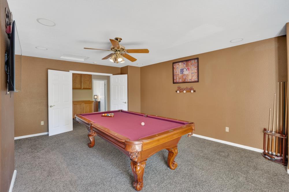 6504 Swallowsview Court Rocklin, CA 95677 - Photo 37 of 66 a room with pool table and a window