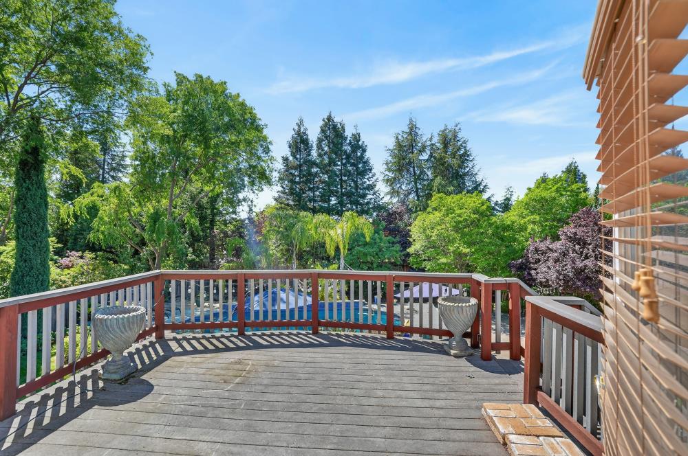 6504 Swallowsview Court Rocklin, CA 95677 - Photo 38 of 66 a view of deck with furniture and trees in the background