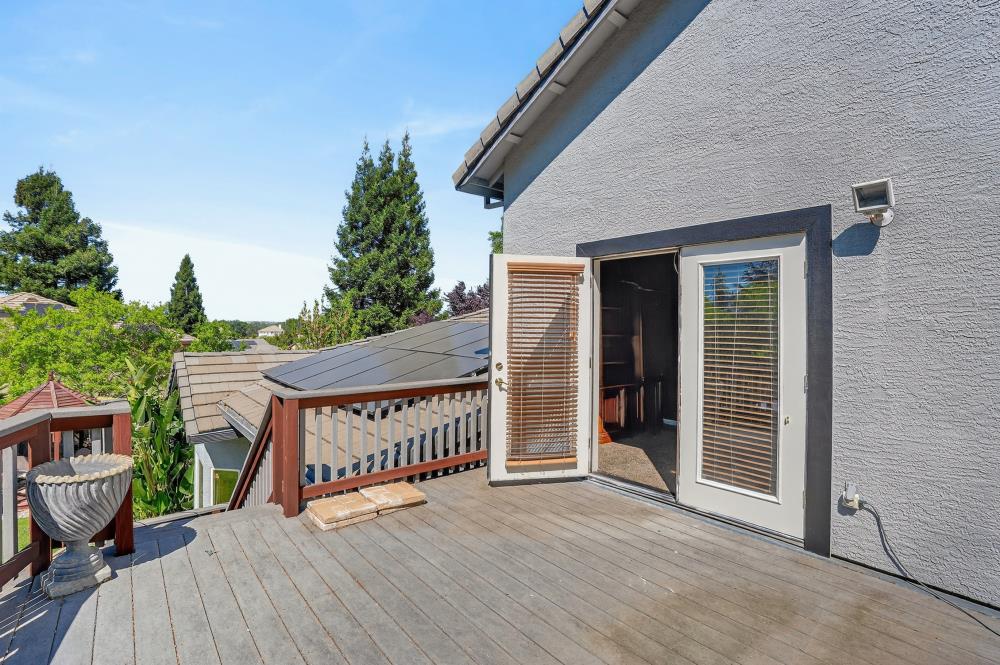 6504 Swallowsview Court Rocklin, CA 95677 - Photo 39 of 66 a view of a house with porch and wooden floor