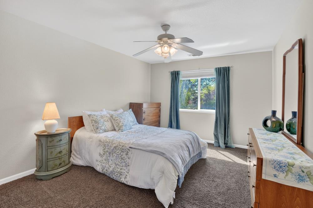 6504 Swallowsview Court Rocklin, CA 95677 - Photo 42 of 66 a bedroom with a bed and window