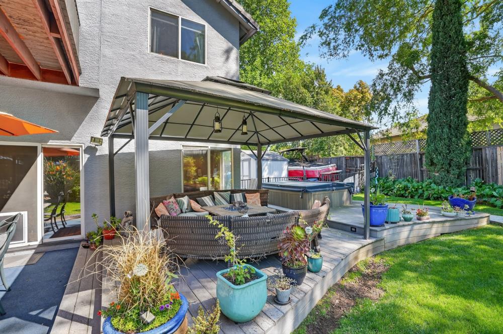 6504 Swallowsview Court Rocklin, CA 95677 - Photo 50 of 66 a view of a patio with chairs and potted plants