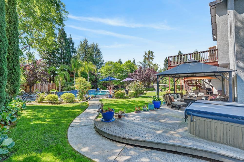 6504 Swallowsview Court Rocklin, CA 95677 - Photo 53 of 66 a view of a park with large trees and plants