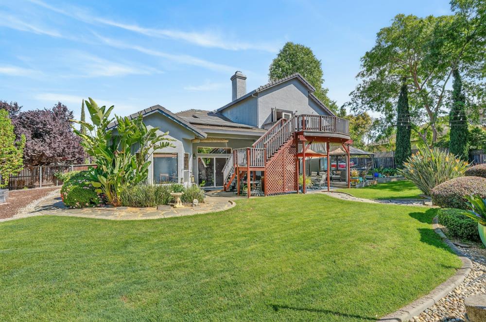 6504 Swallowsview Court Rocklin, CA 95677 - Photo 57 of 66 a front view of house with yard outdoor seating and green space
