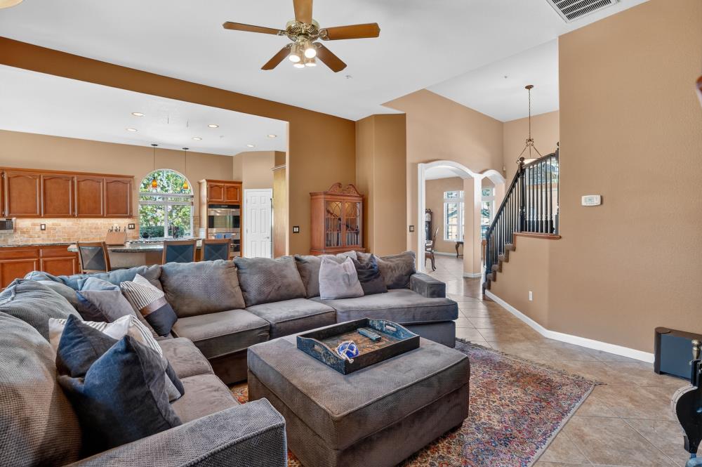 6504 Swallowsview Court Rocklin, CA 95677 - Photo 9 of 66 a living room with furniture and a rug