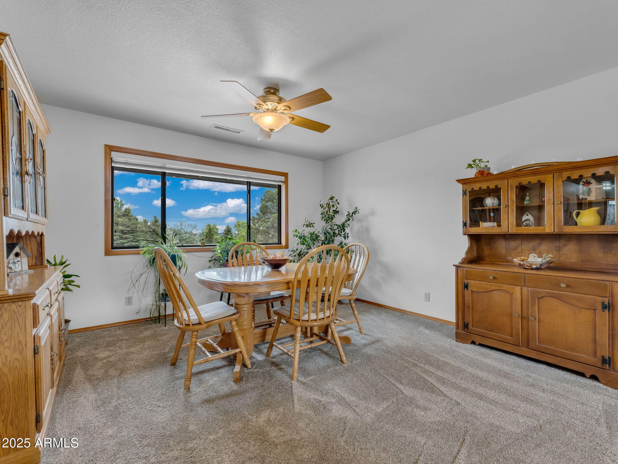 5545 East Atkinson Road Flagstaff, AZ 86004 - Photo 11 of 55 a dining room with furniture and window