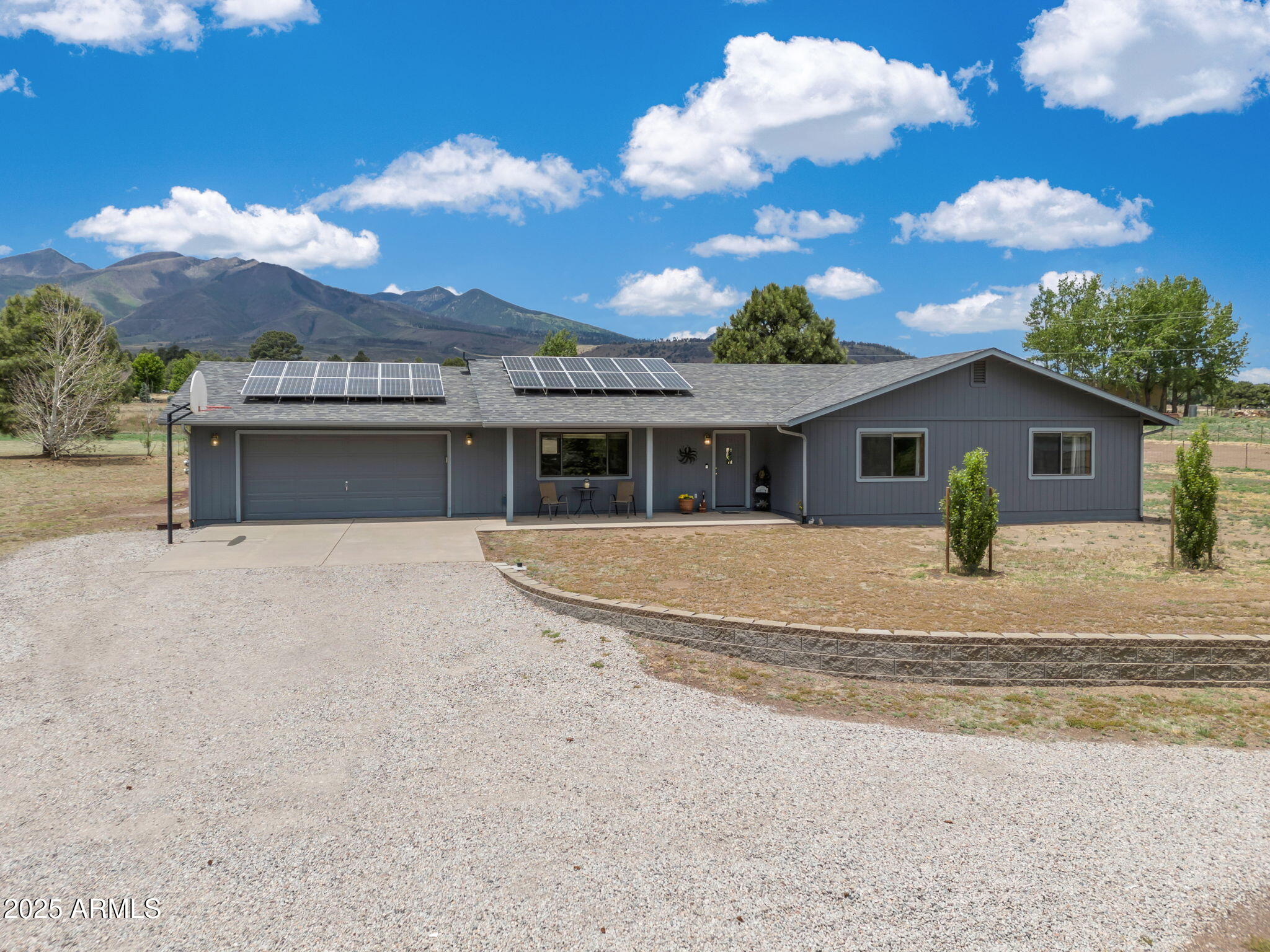 5545 East Atkinson Road Flagstaff, AZ 86004 - Photo 2 of 55 a view of front a house with a yard