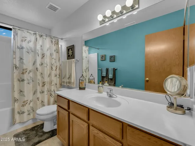 a bed room with a bed and a window