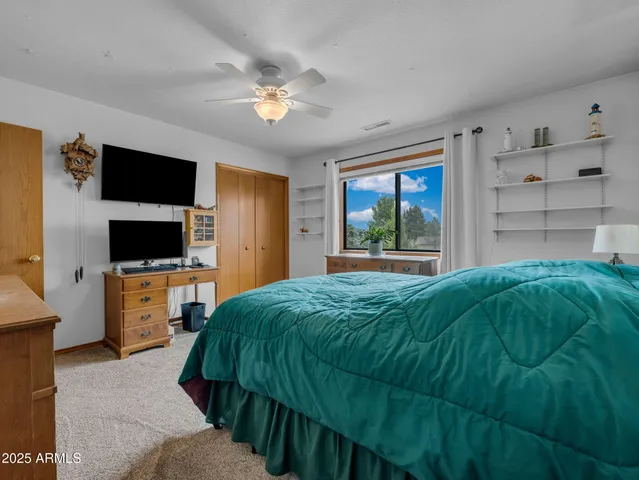 a view of a lake with outdoor seating